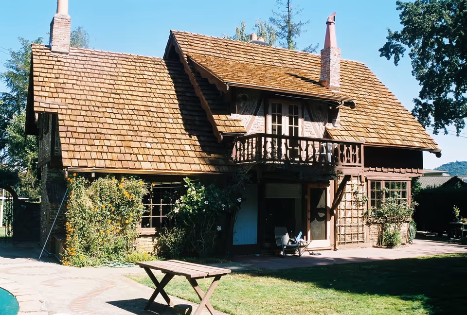 Cedar shingle roof on a storybook cottage — residential roofing by Northern Pacific Roofing