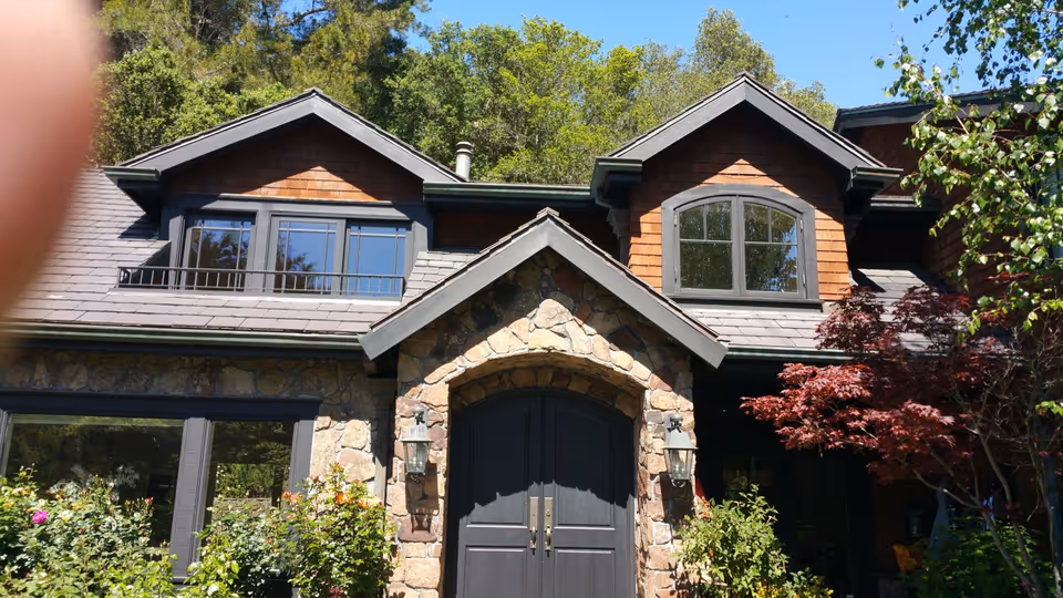 Slate-look composition shingle roof on a craftsman home — residential roofing by Northern Pacific Roofing