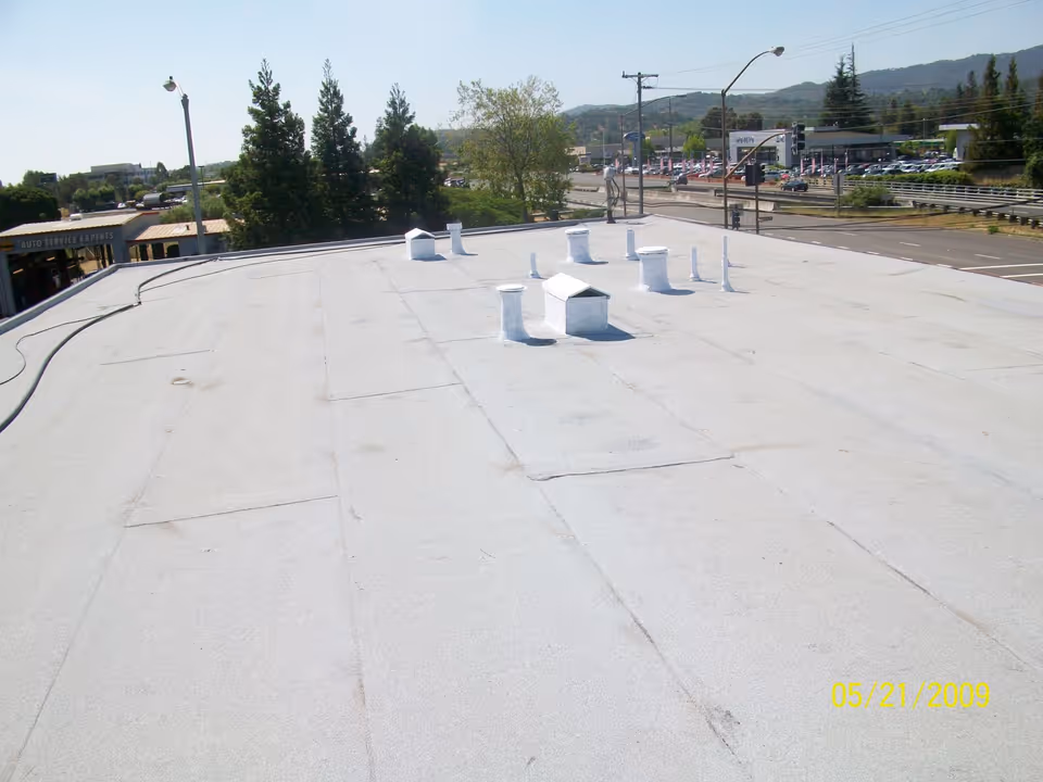 Completed flat-roof system at 7020 Redwood Blvd in Novato, CA — commercial roofing by Northern Pacific Roofing