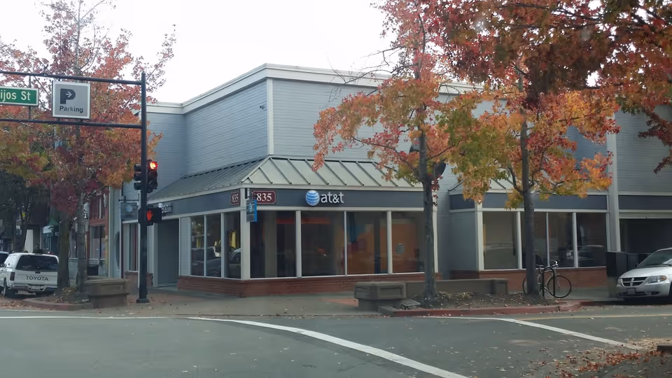 Polyglass flat-roof membrane on a commercial storefront in San Rafael, CA — flat roof waterproofing by Northern Pacific Roofing