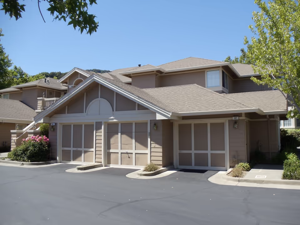 Composition shingle roofs across a townhome community — multi-family roofing by Northern Pacific Roofing