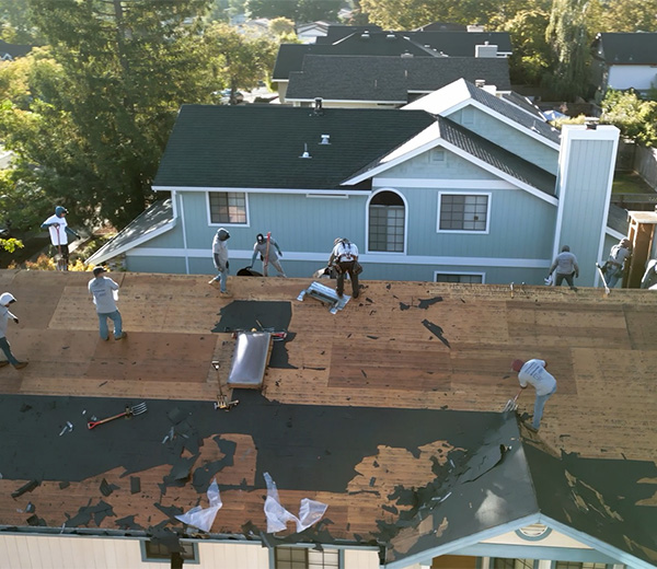 Aerial view of a residential roof being installed